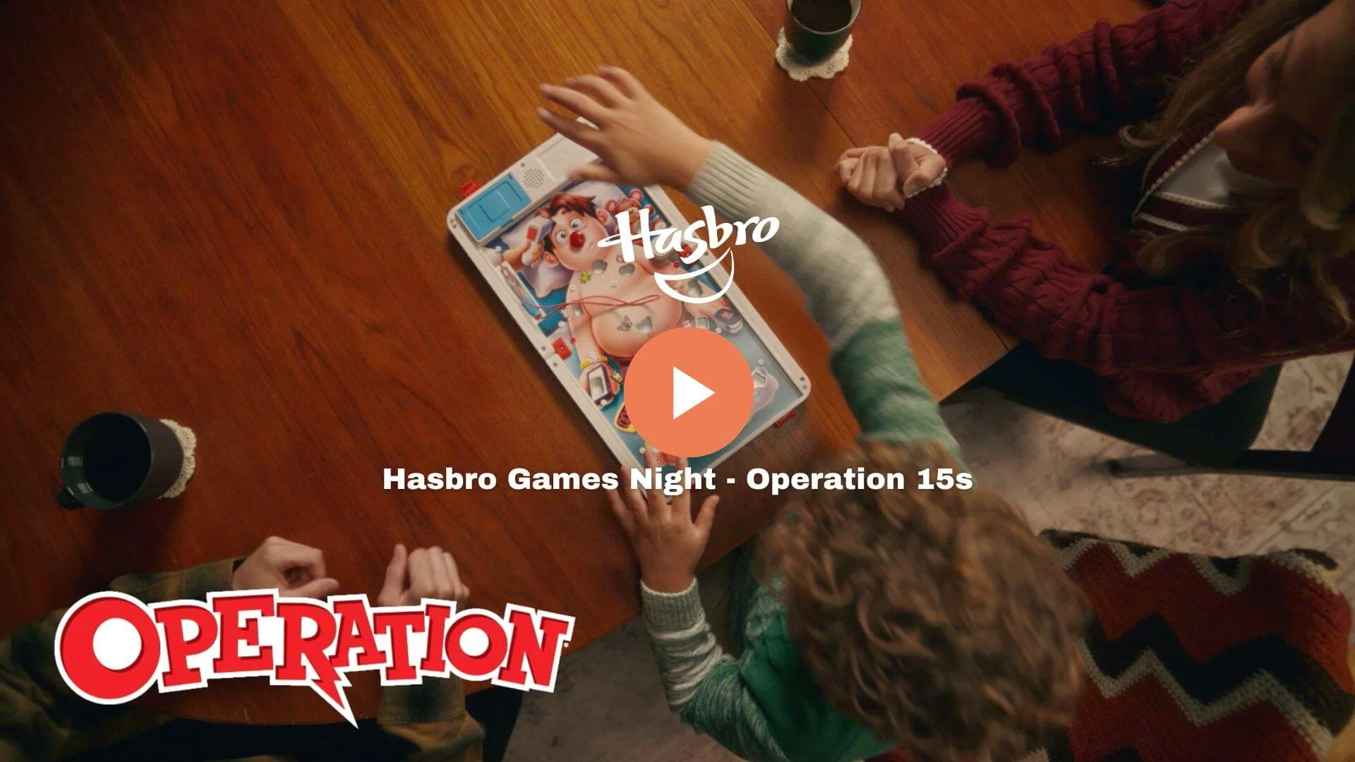 Children playing a game of Operation on a wooden table with coffee mugs nearby.
