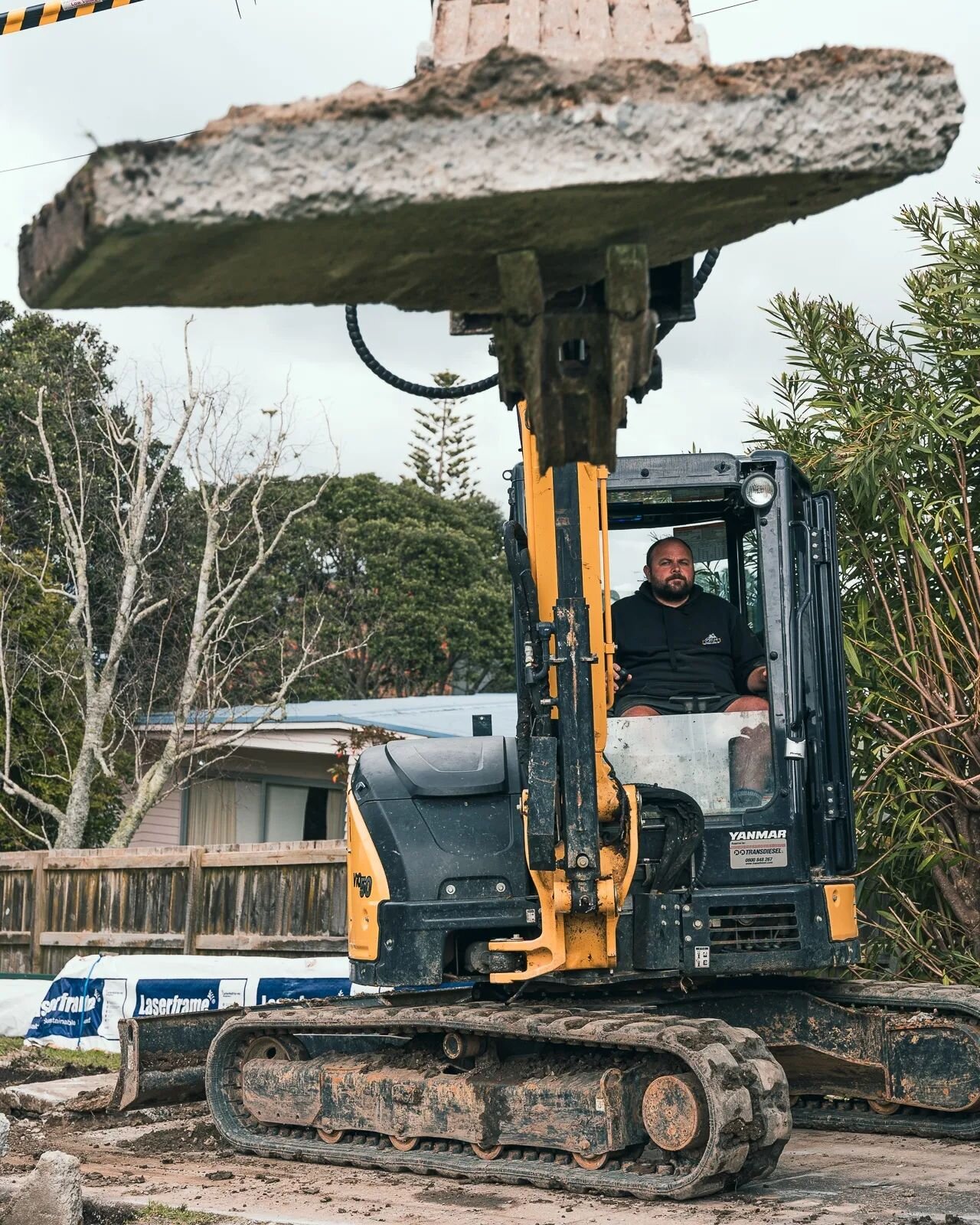 Nathan breaks up an old driveway out near gulf harbour for a new garage to take its place.

You always need to be surgical when placing the large concrete chunks in the rear of the truck or else you could cause some serious damage which wouldn't go d