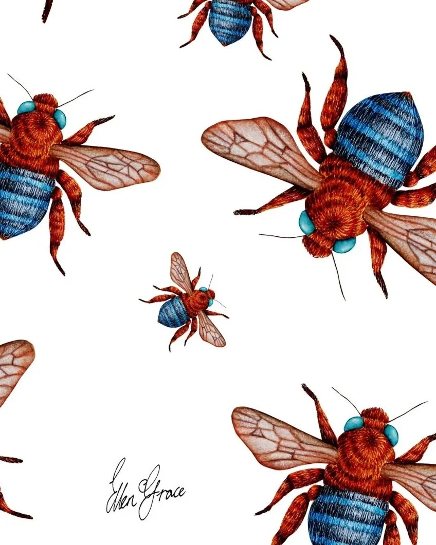 Close up of hand-painted bee artwork showing detailed bees with blue-banded bodies and translucent wings scattered across a white background.