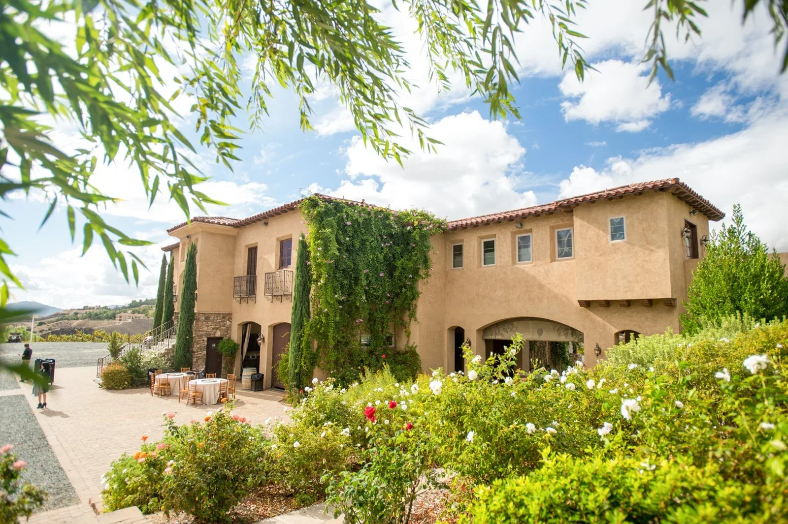 Temecula wine country at Gershon Bachus Vintners with ivy covered villa and panoramic valley views