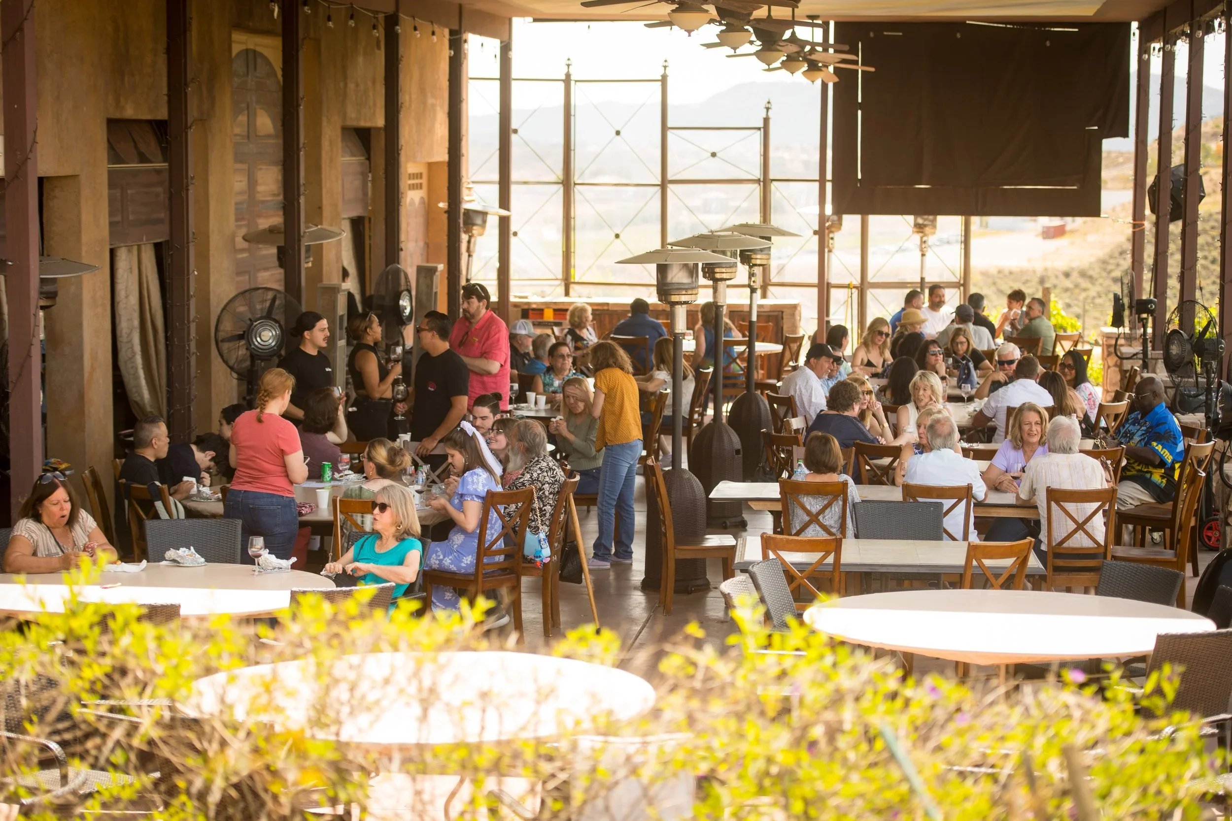 Temecula wineries with views at Gershon Bachus Vintners featuring covered heated patio and vineyards