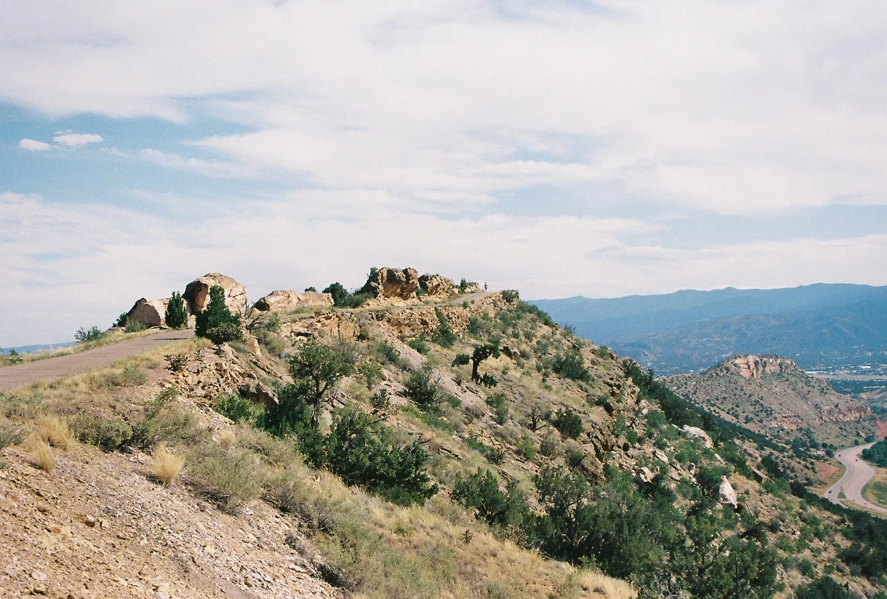near canon city. you can barely see charlie on the road. taken on a 1974 nikkormat