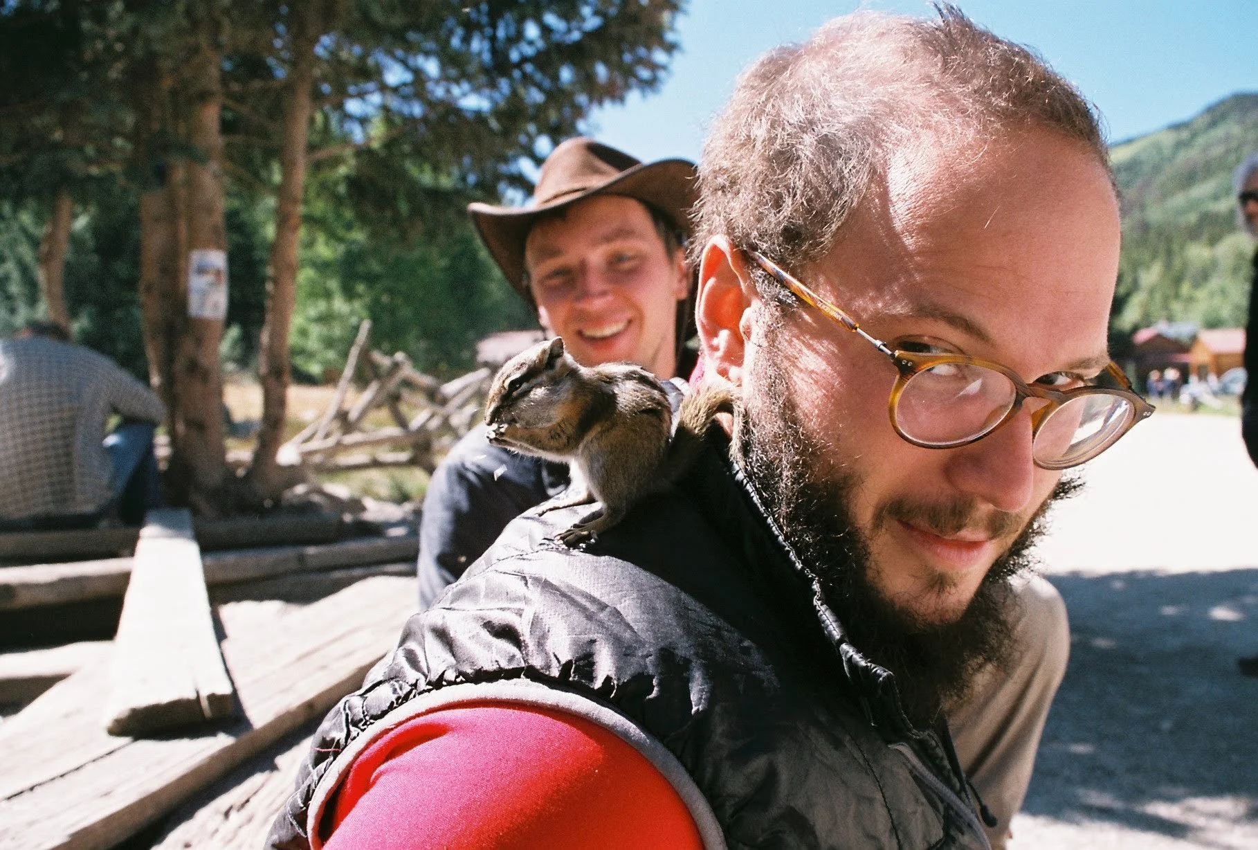 st. elmo, colorado. dan and charlie were feeding the squirrels. 1974 nikkormat