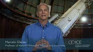 Professor of the program Marcus Gleiser presenting on screen