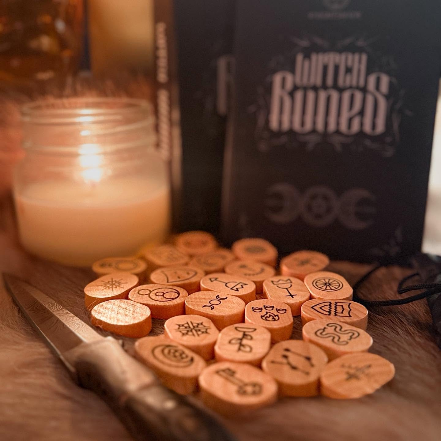Witch Runes: rune set by candlelight with the Witch Runes box