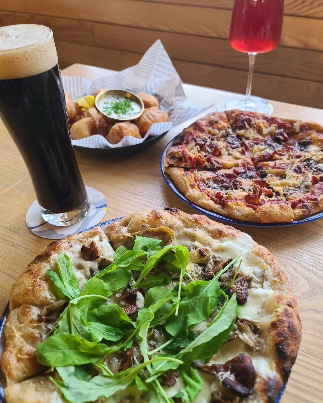Brewing up pizza perfection! Our stone oven pizzas start with slow-ferment, thin-crust dough made with spent grain straight from our brewery.

The spent grain (a byproduct of the brewing process) is dehydrated overnight in our oven before it&rsquo;s 