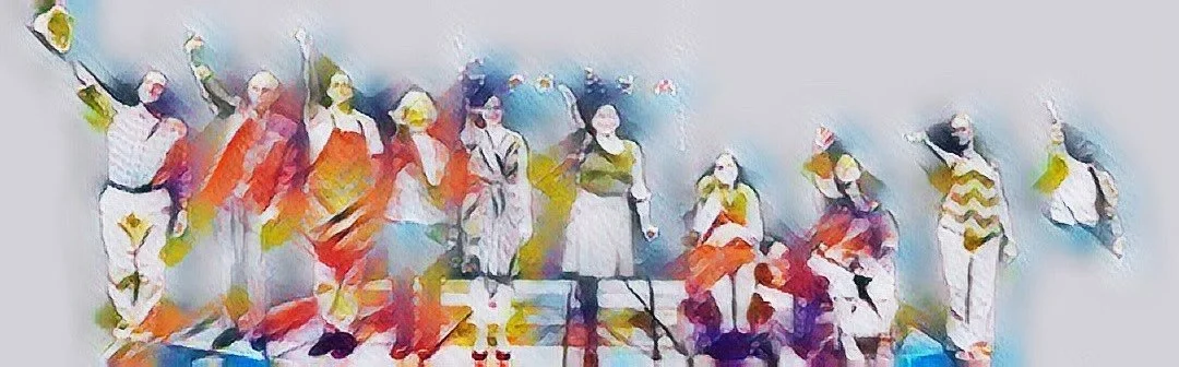 10 actors, doing a curtain call on stage. One man has a cane, a woman is on crutches, and two other women are in wheelchairs with a multi-colored filter in the foreground.