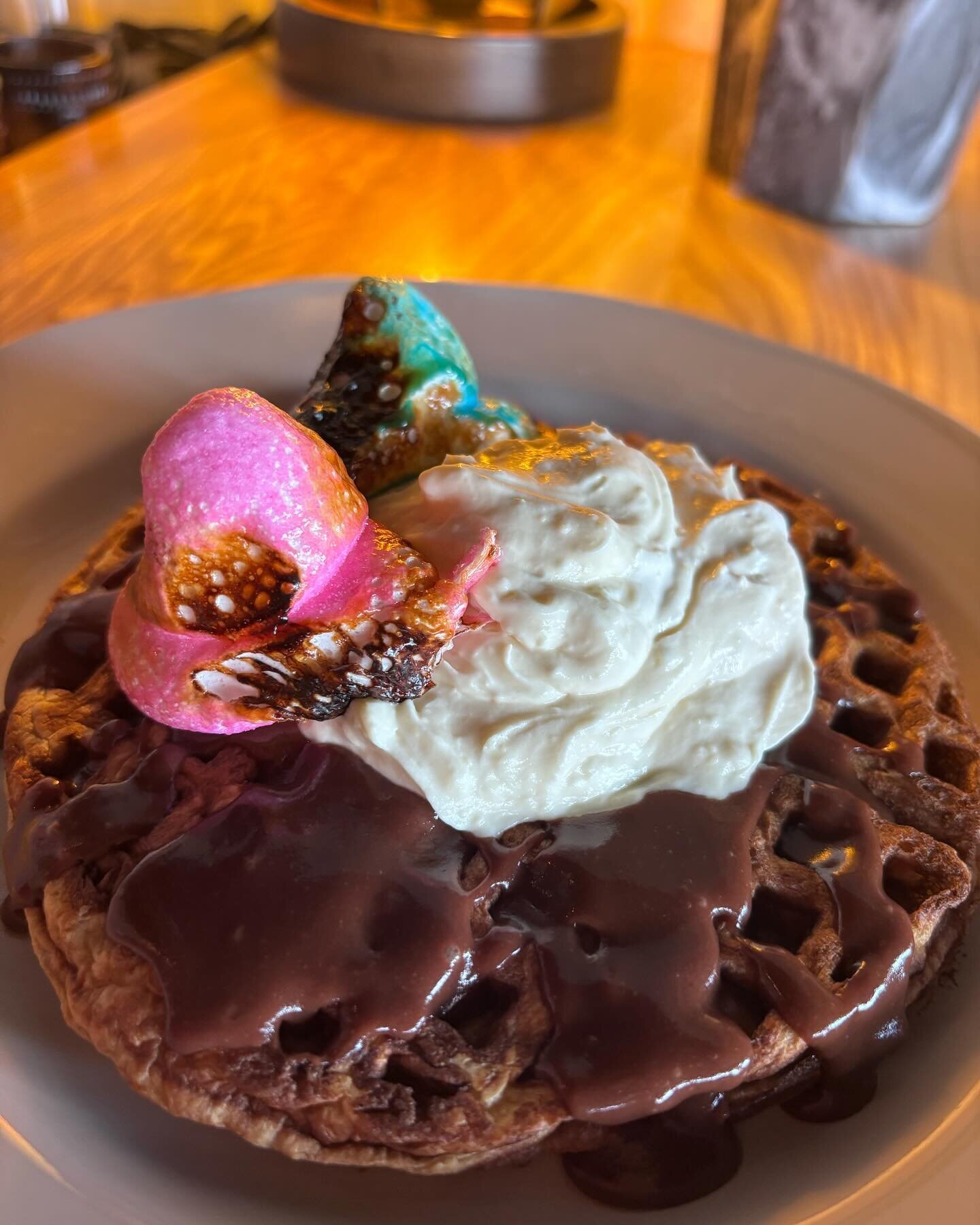 She may look a wreck BUT tbh, this slaps. Imagine if you will a #cadbury cream egg melted upon a waffle, topped with a lil dollop of Bavarian cream and then two little br&ucirc;l&eacute;e&rsquo;d #peeps perched atop their waffle nest. 

$14 today onl