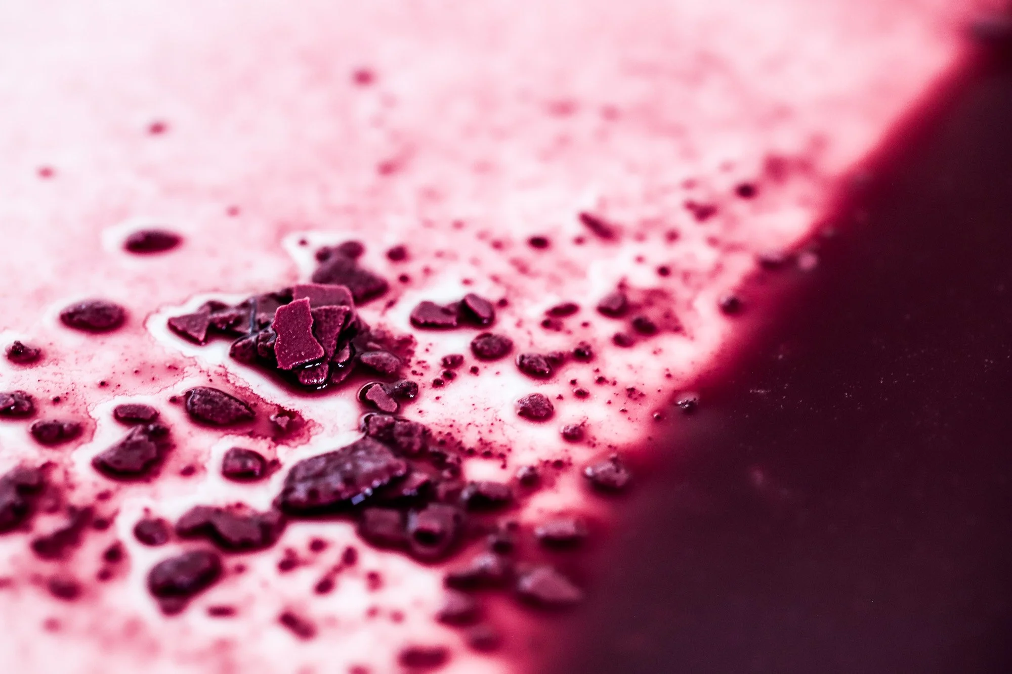 close up of red wine sediment