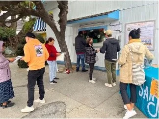 People taking survey for Berryessa Flea Market