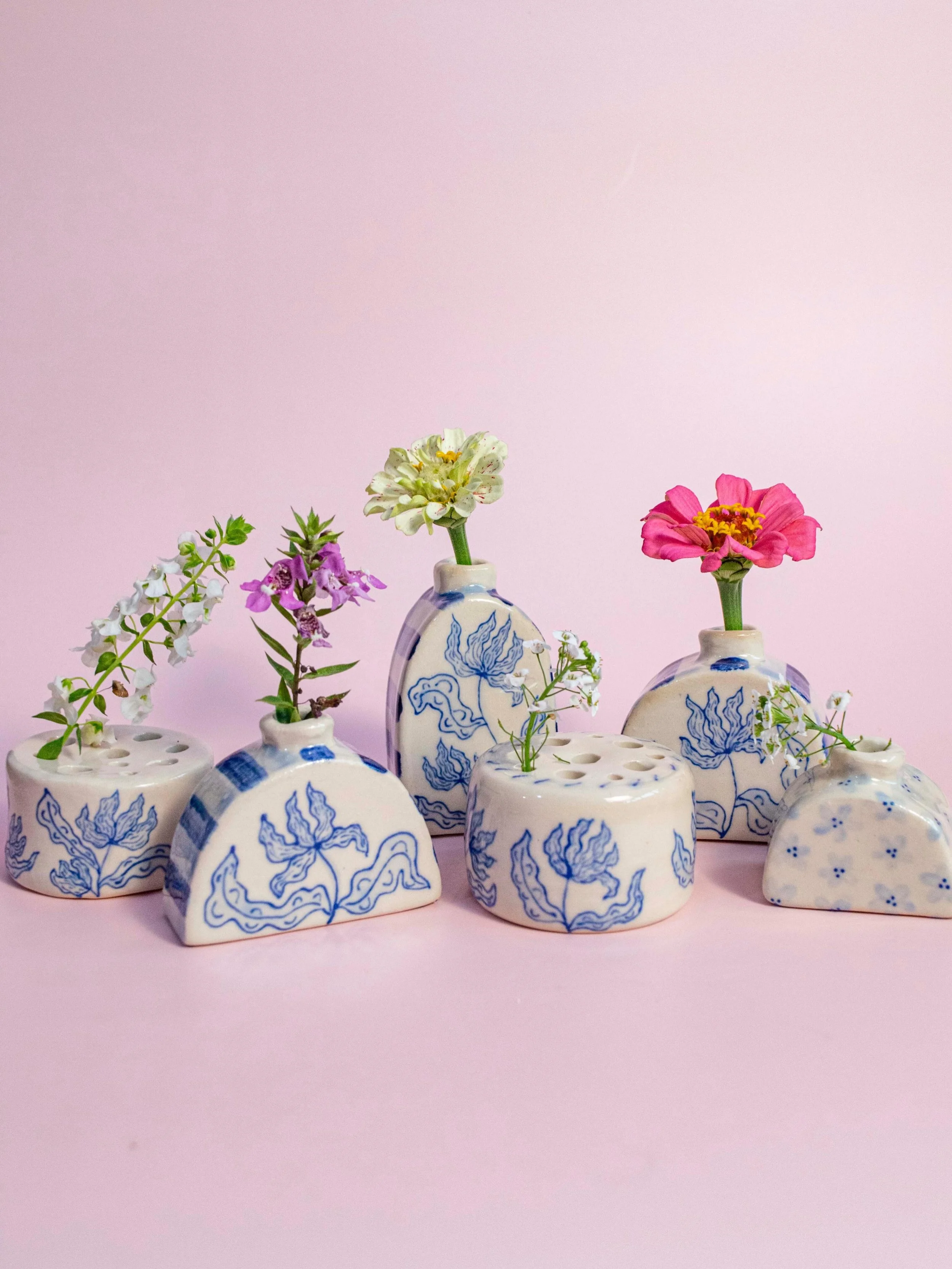 I am so in love with my blue and white floral collection. They are giving whimsy and traditional, it&rsquo;s a wonder my house isn&rsquo;t covered in these guys #pottery #shopsmall #handmade #clay #collection