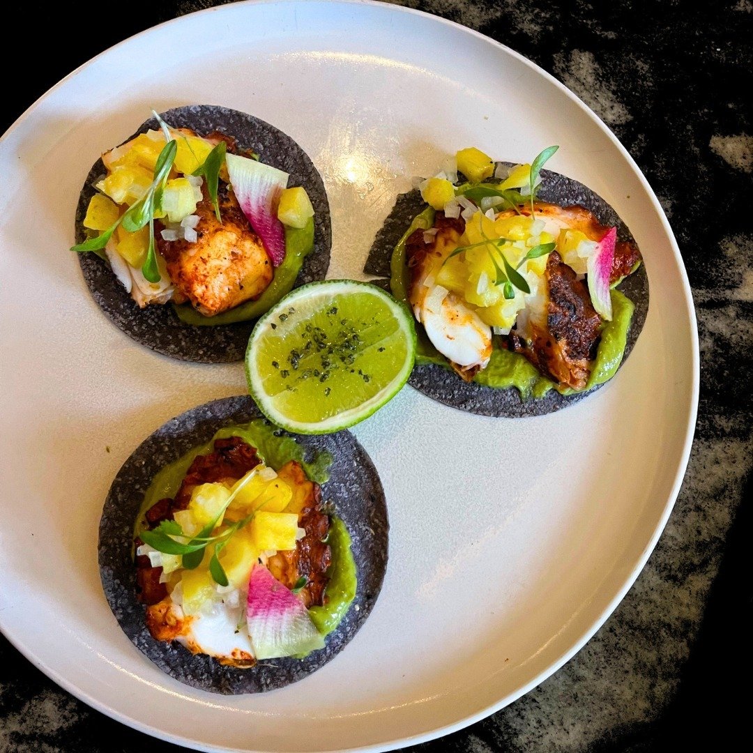 Toro Toro&rsquo;s Pulpo Al Pastor Tacos features tender grilled octopus, marinated in achiote adobo and topped with fresh tomatillo salsa, cilantro, grilled pineapple &amp; salsa macha. Each bite offers a fusion of savory and tangy notes, capturing t