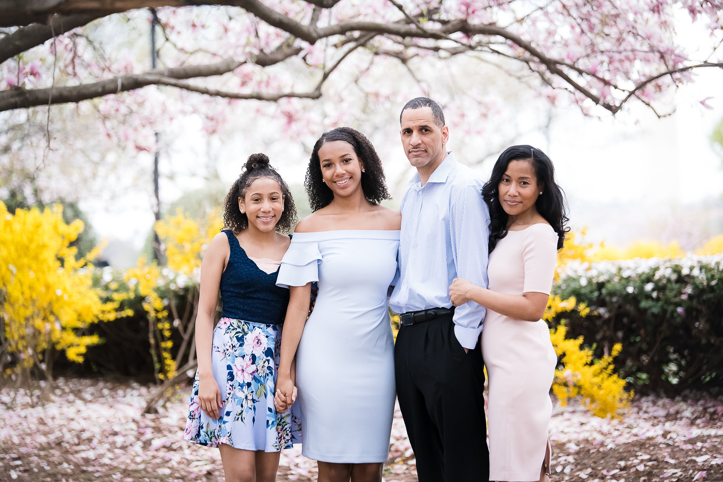 Cherry blossom family photo in Washington DC