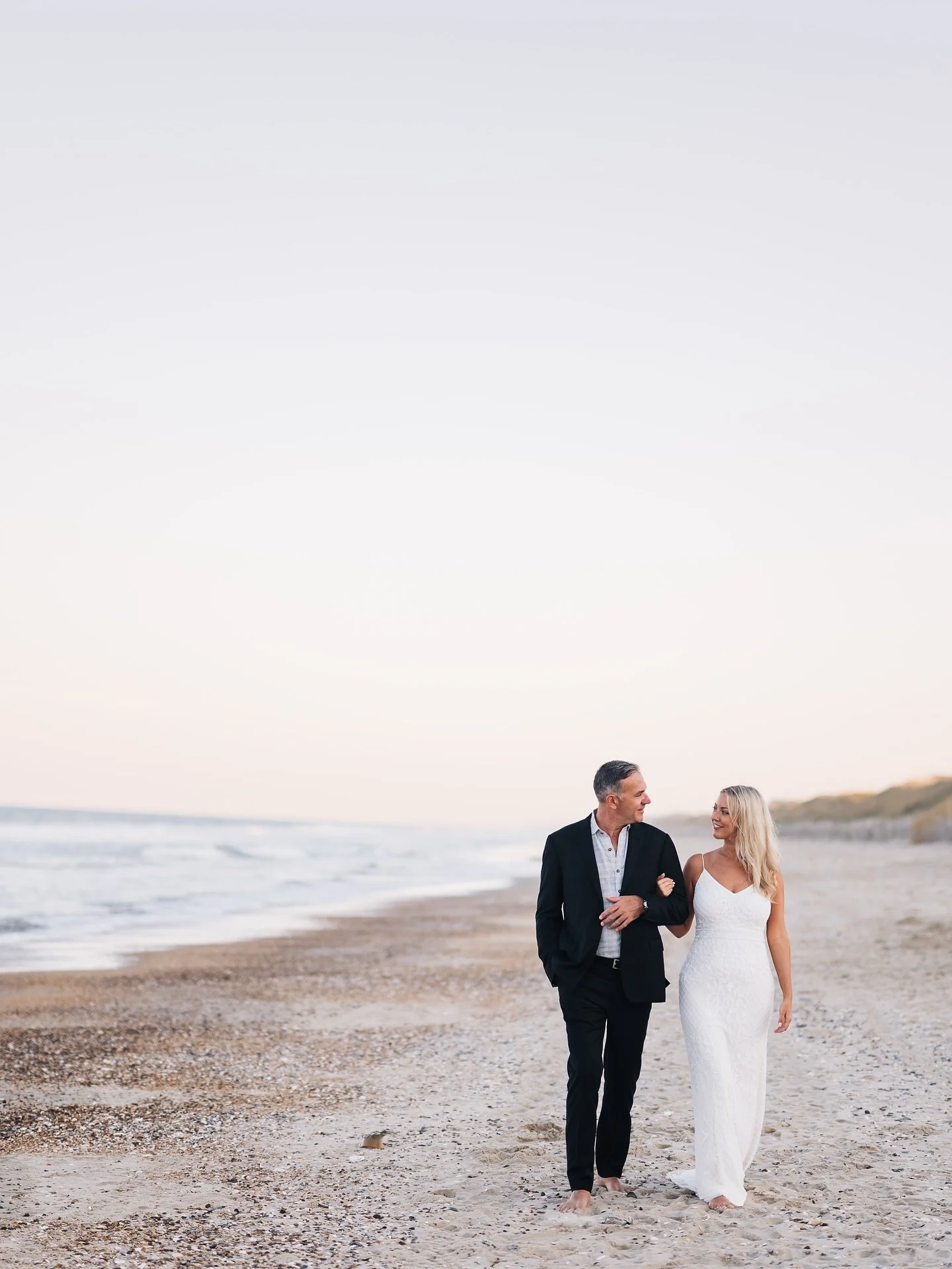 Two incredible people who decided to spend their lives by the water and with each other 🖤

📍 OBX North Carolina 
Photography - @dcorzo_photography
Planning @tohaveandtoholdobx
Video @reelloveweddings
DJ @adventures_of_djing
Decor &amp; Florals @ido