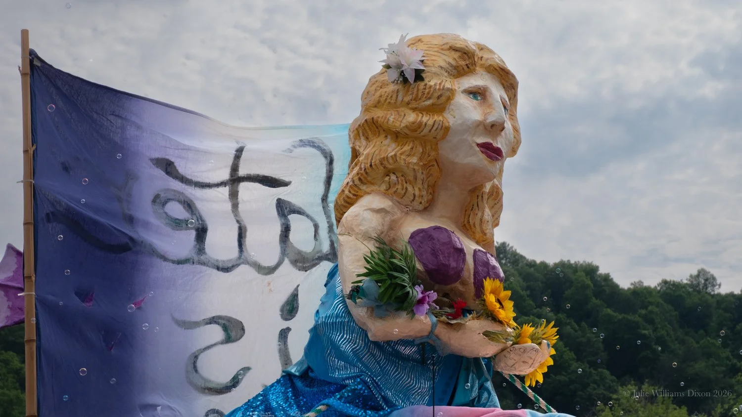 The Mermaids bring a message: Another world is possible.