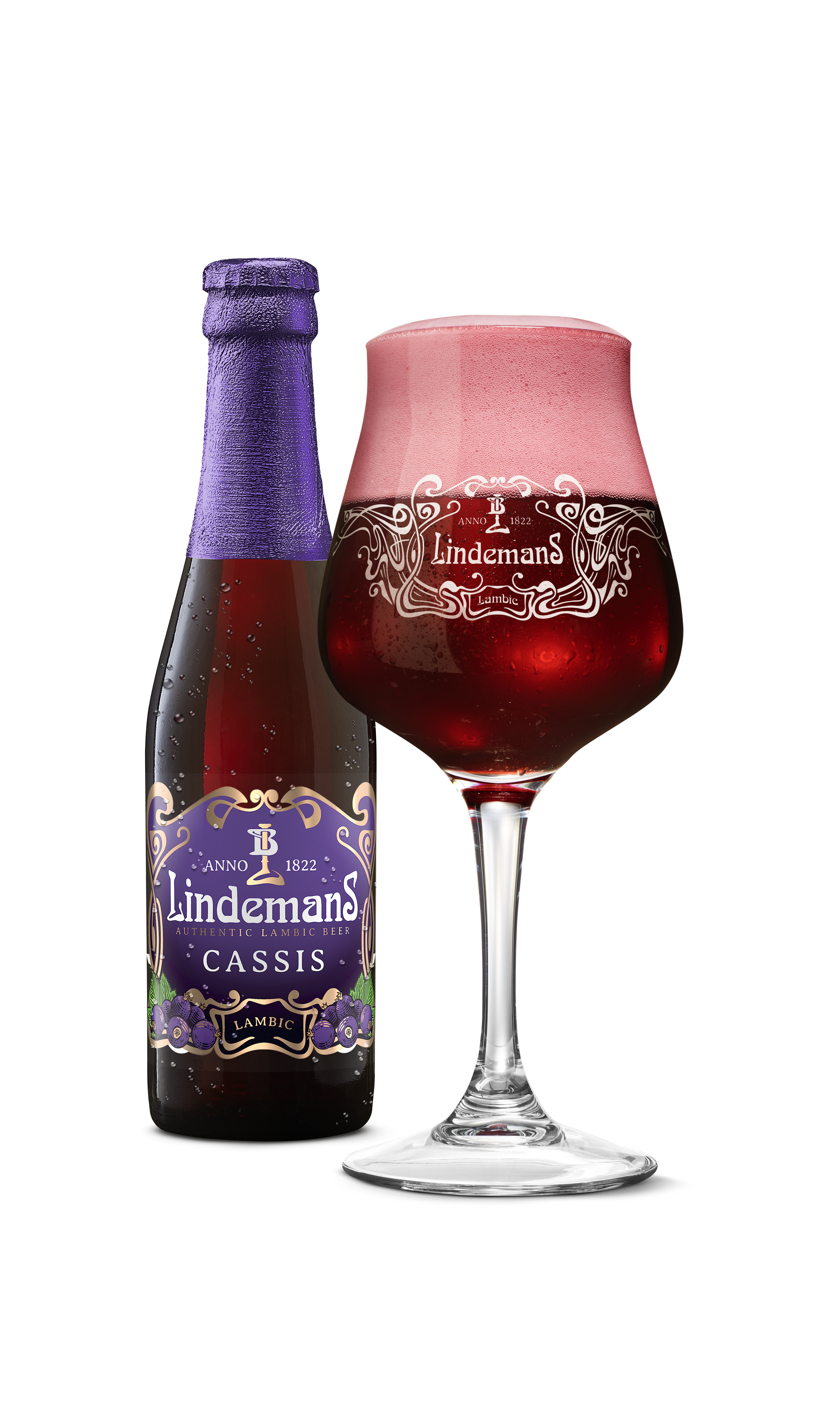 Bottle of Lindemans Cassis Lambic beer with glass full of Lindemans Cassis beer next to bottle