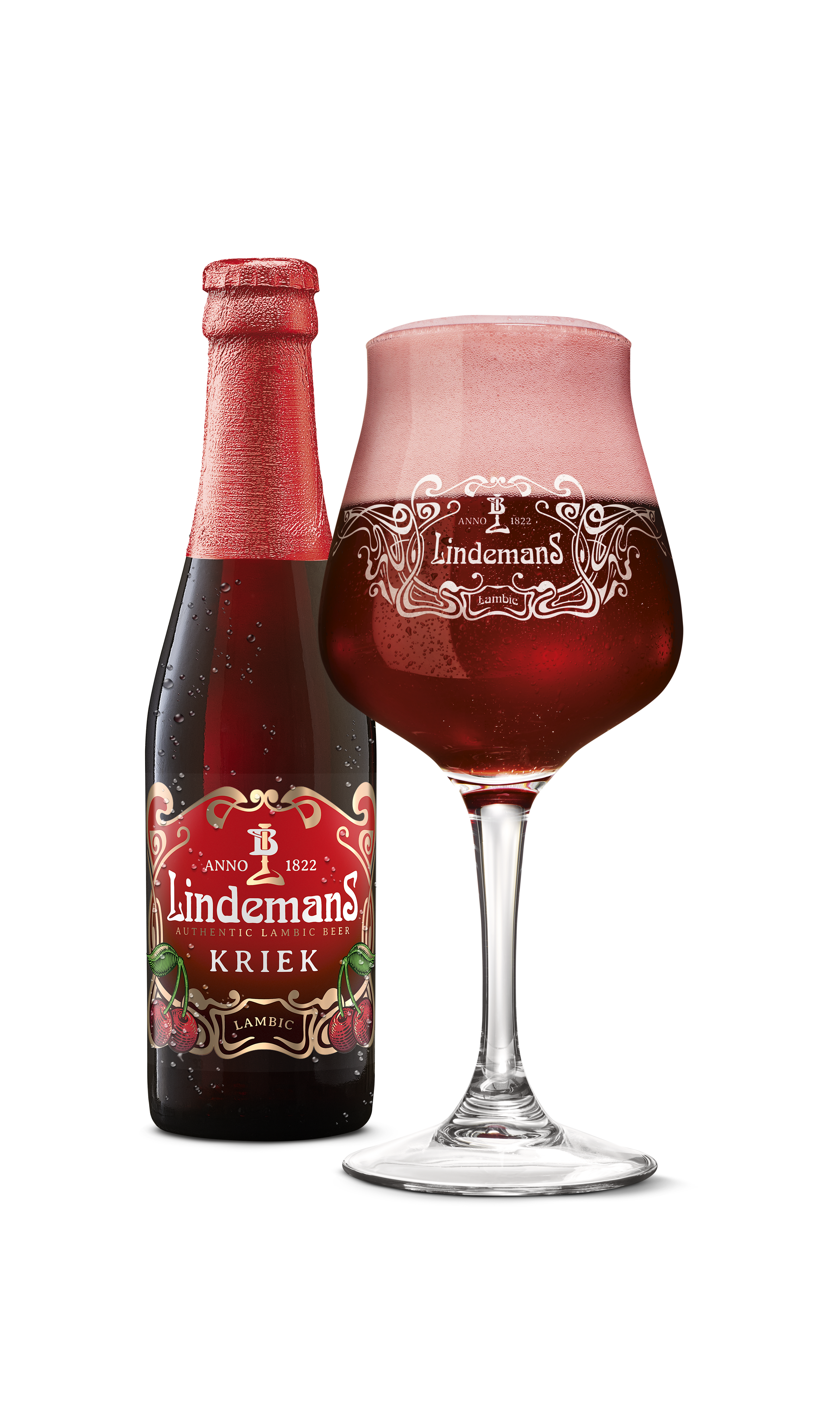 A bottle of Lindemans Kriek Lambic beer and a glass of Lindemans Kriek Lambic beer with a frothy head beside it.