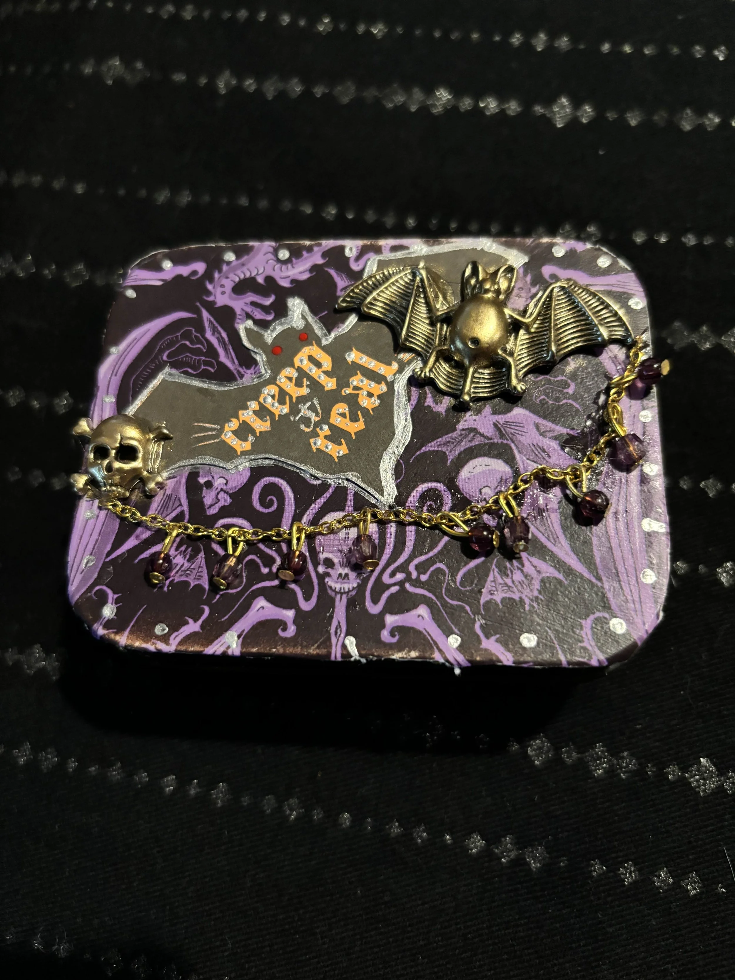 purple tin with bats 1.jpg