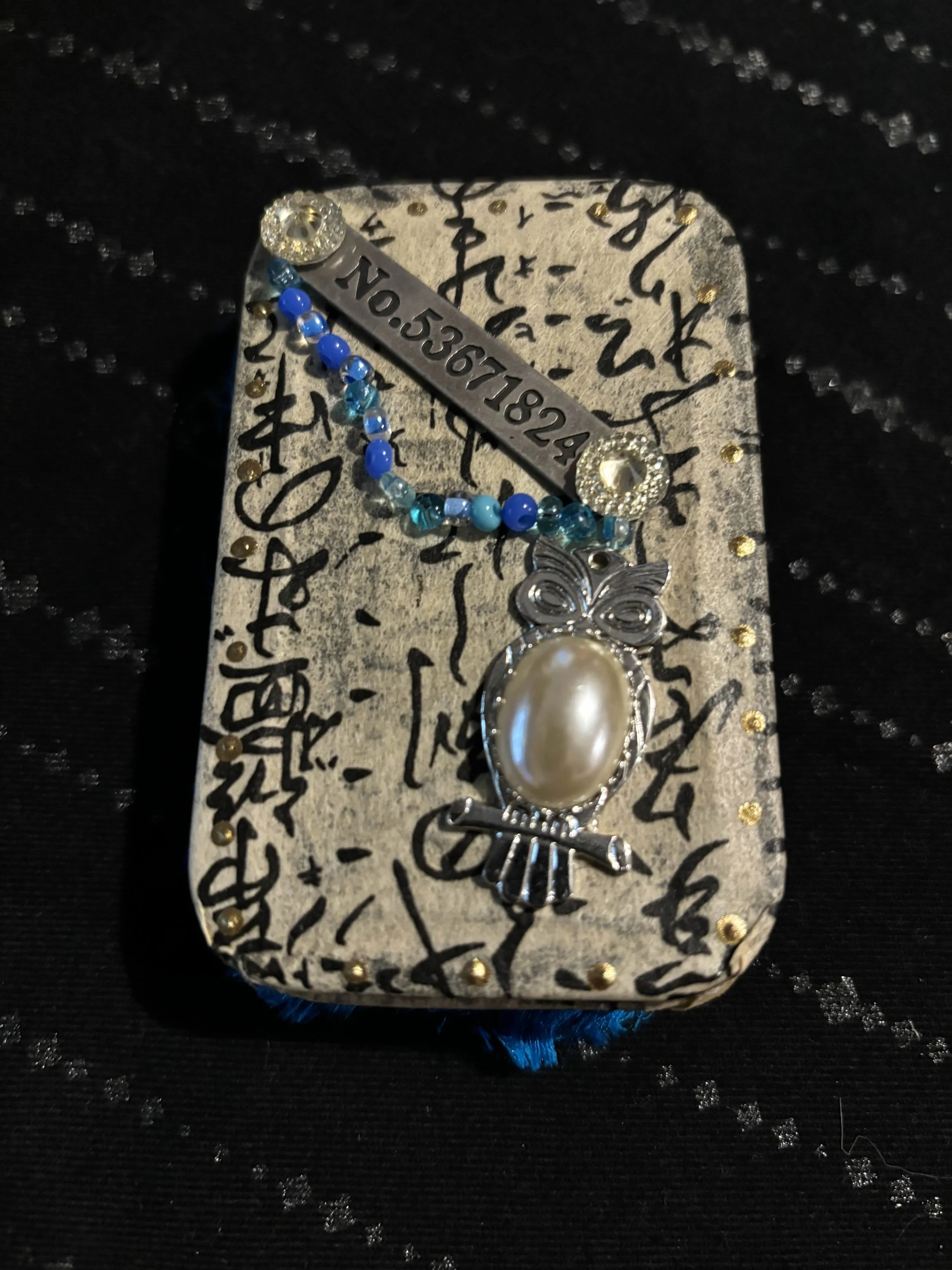 blue tin with owl 1.jpg