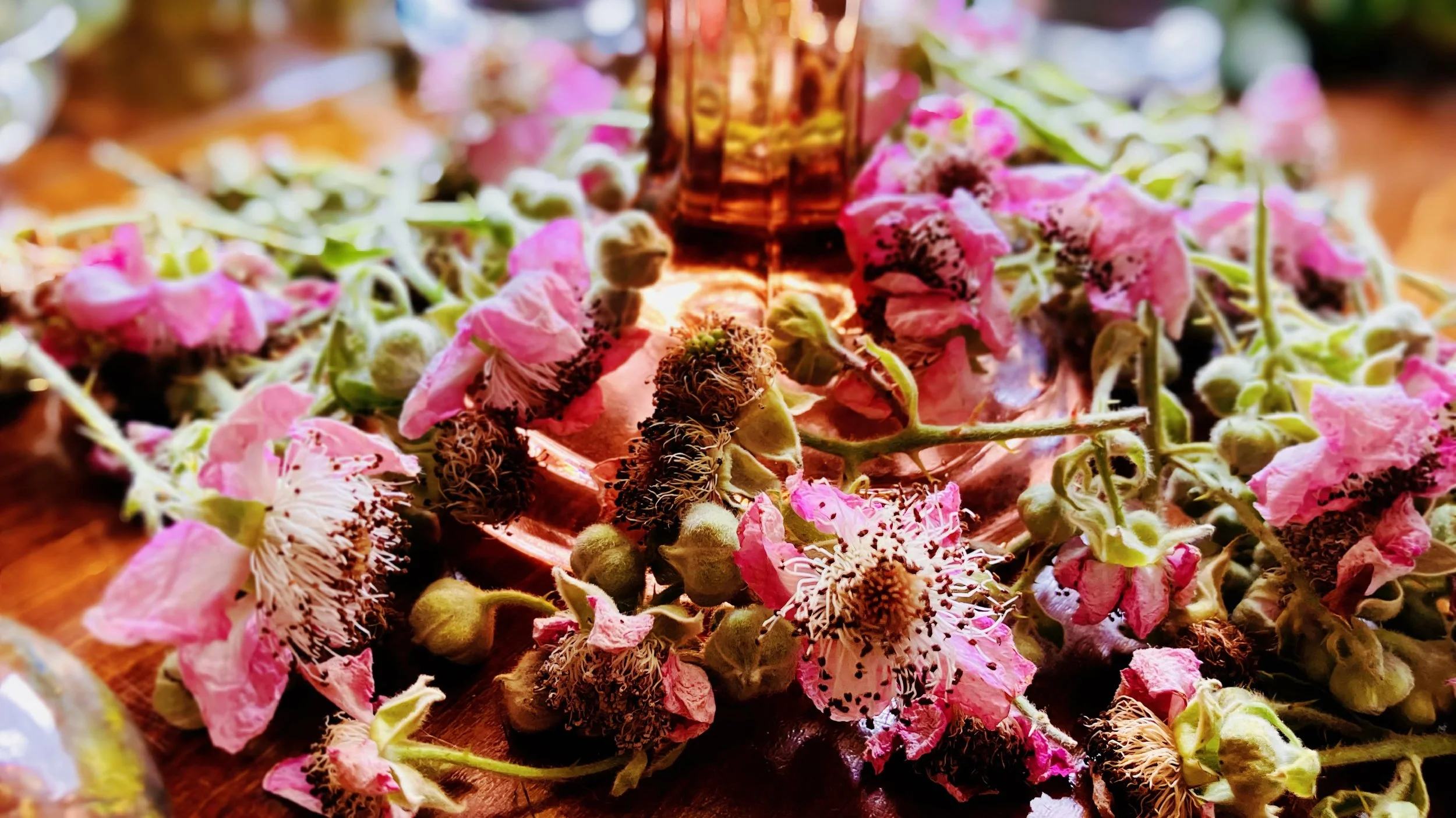 Women's circle altar with seasonal flowers for Lammas in Bristol
