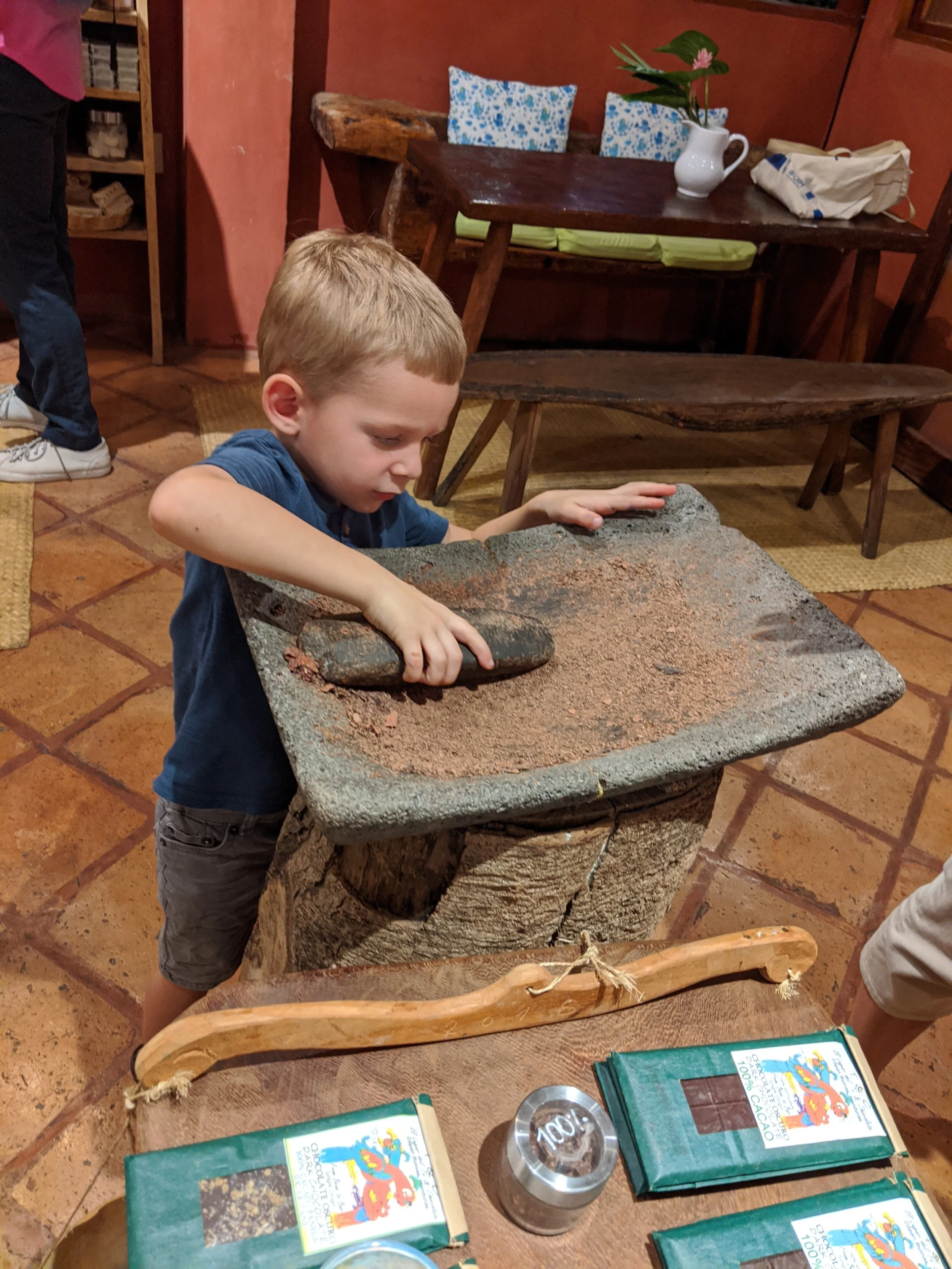 Grinding chocolate the traditional way.jpg