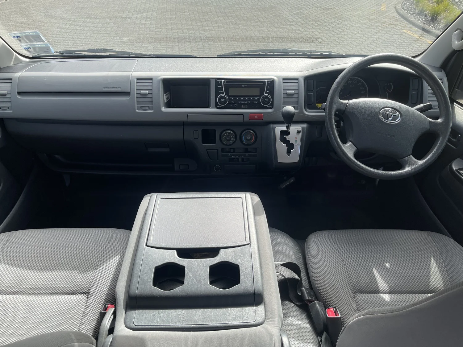 Toyota Hiace cab, dashboard, steering wheel and front seats