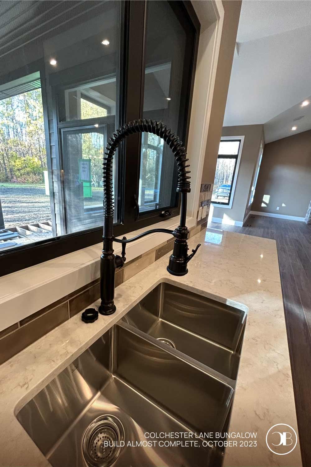 Scenic sinks: Where every dish comes with a view. Build almost complete for Colchester Lane Bungalow, by Carson Built Homes.