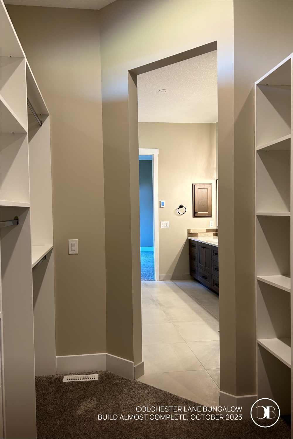 From bathroom, to walk-in closet (and then to laundry!). Build almost complete for Colchester Lane Bungalow, by Carson Built Homes.