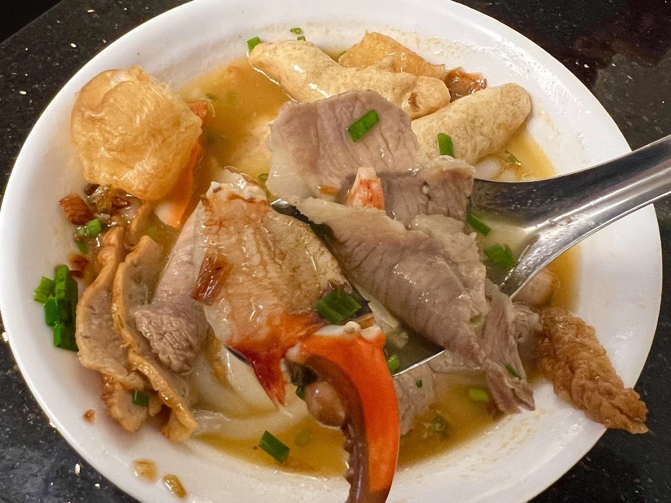 Street food in Ho Chi Minh City banh canh cua crab and shrimp noodle soup
