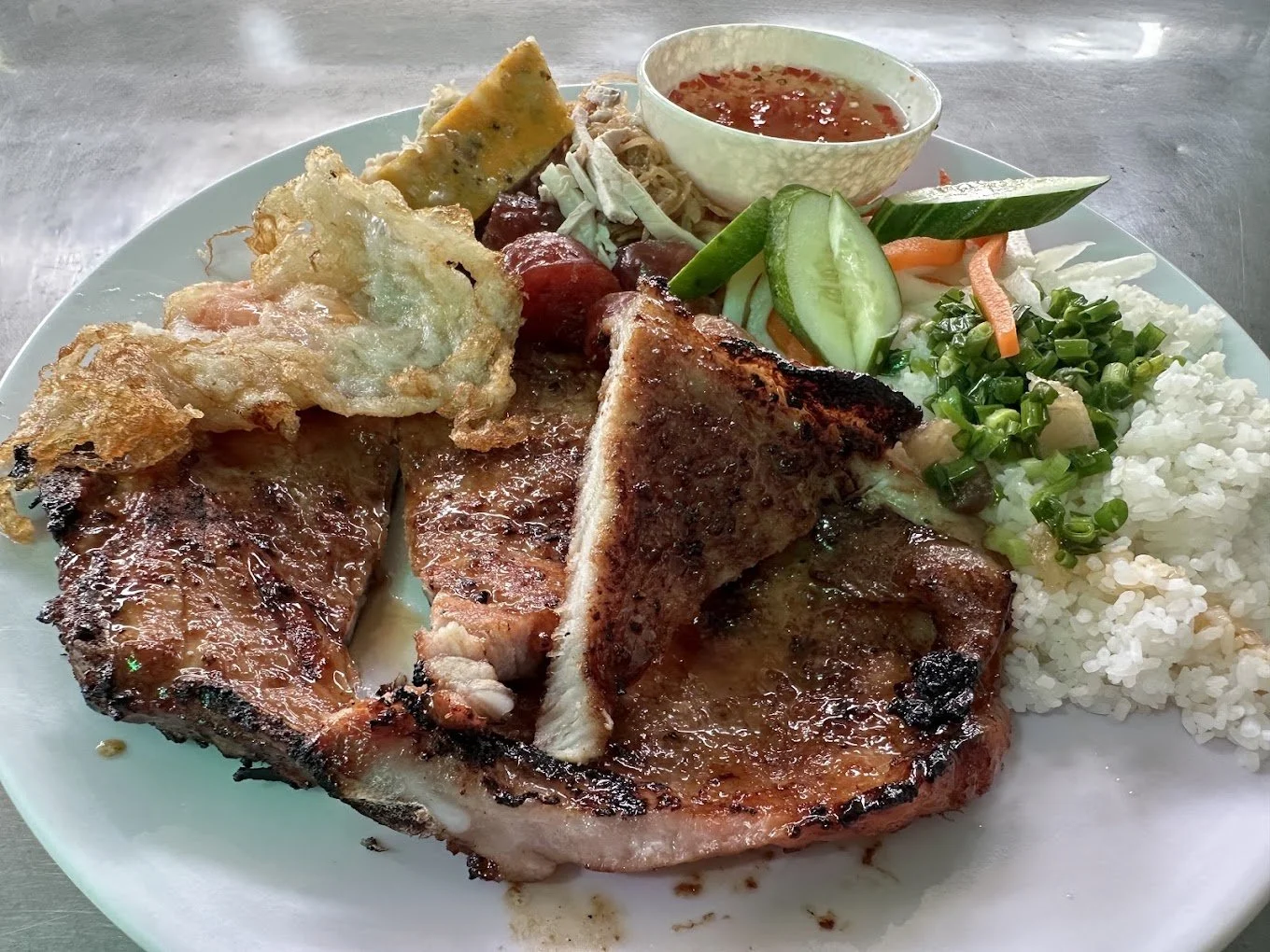 Street food in Ho Chi Minh City com tam ba ghien