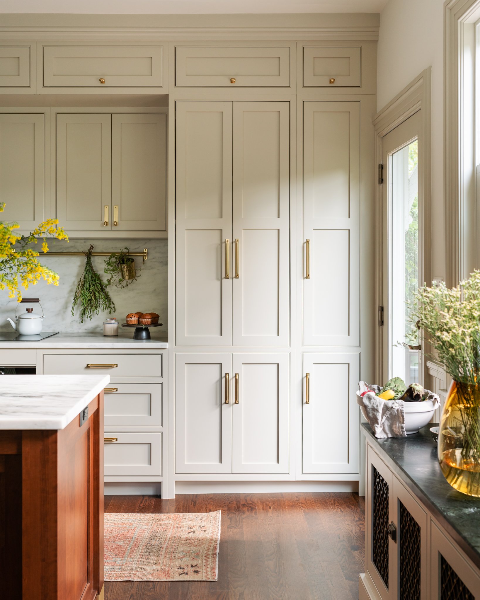 Light Beige Kitchen Cabinetry with Oval Brass Knobs - Transitional - Kitchen