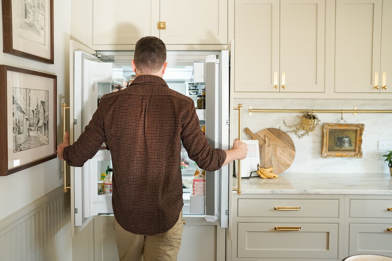 Beige Kitchen Cabinetry with Brass Pulls - Transitional - Kitchen