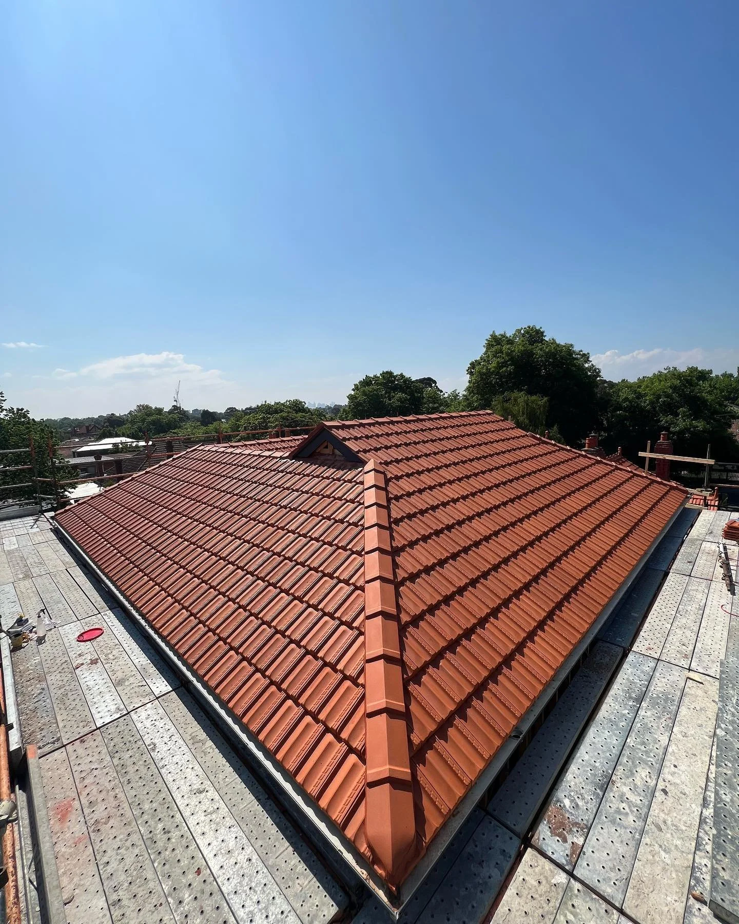 The roof is on, finials and pickets to go on soon. What a difference it makes.