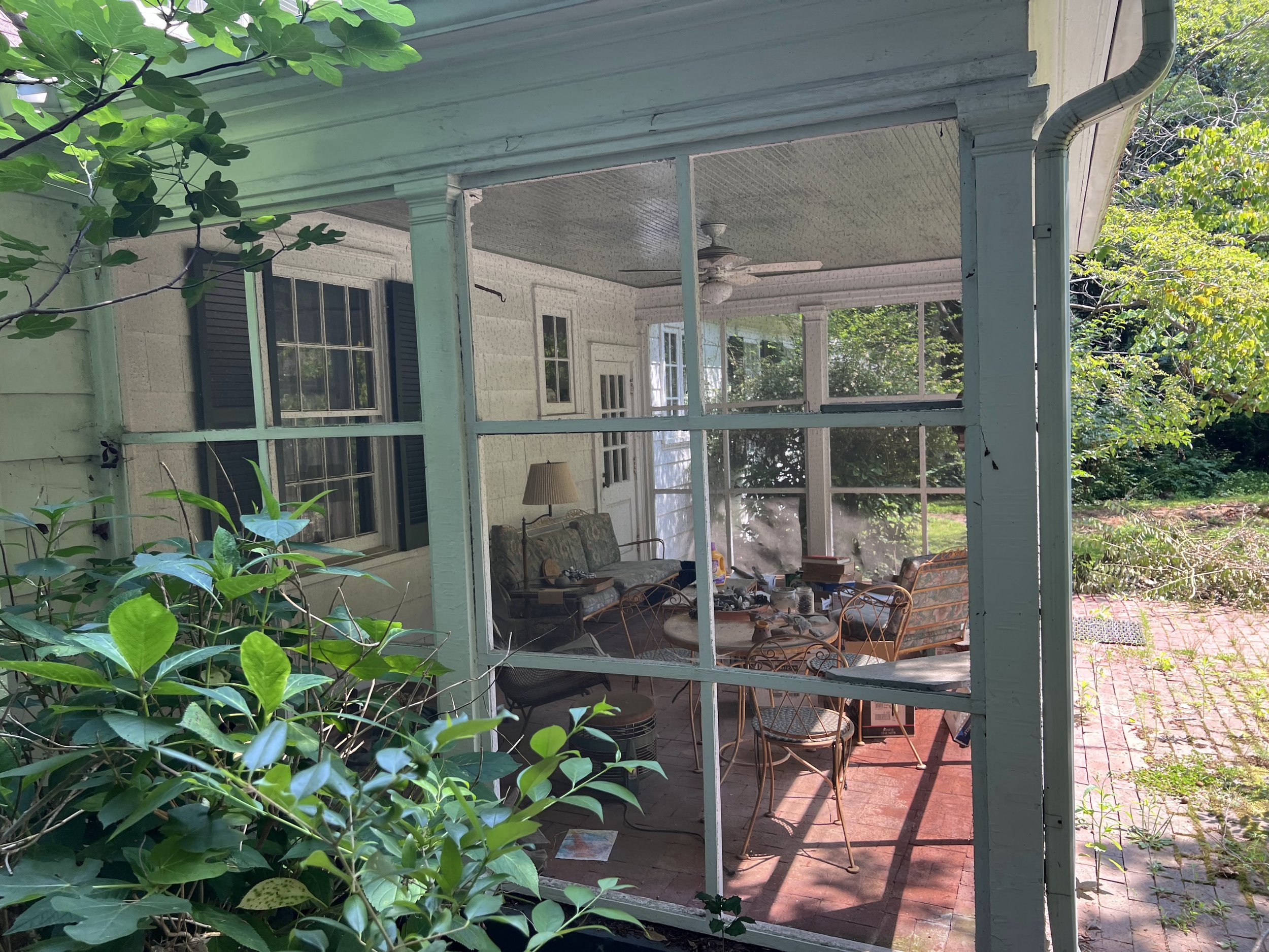 large screened porch in historic home in chapel hill nc renovation by cat french design chapel hill interior designer