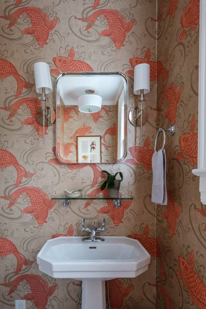 powder bathroom with orange koi wallpaper from cat french design in chapel hill nc
