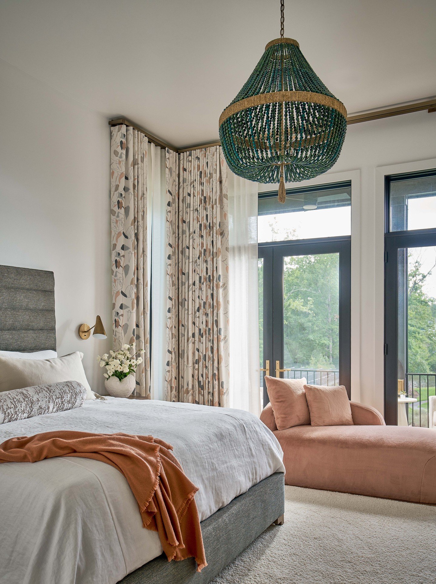 This primary bedroom was designed not just as a stand-alone room, but as part of a retreat-like suite of rooms that includes the bedroom, separate his and hers primary bathrooms, AND (we continue to be very excited about this part 😂) a built-in coff