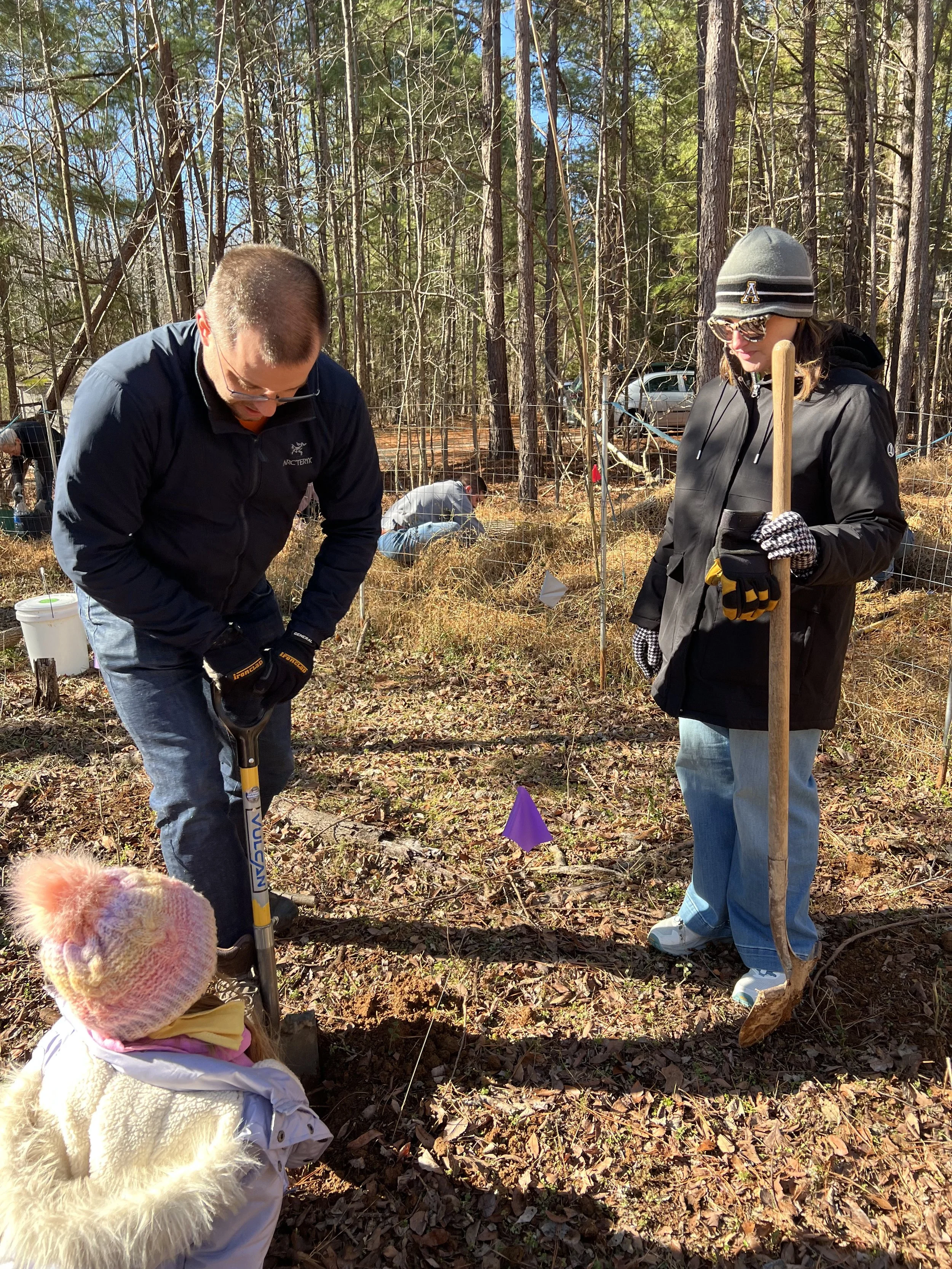 Cat French Design team planting with triangle land conservancy chapel hill interior designer durham interior designer