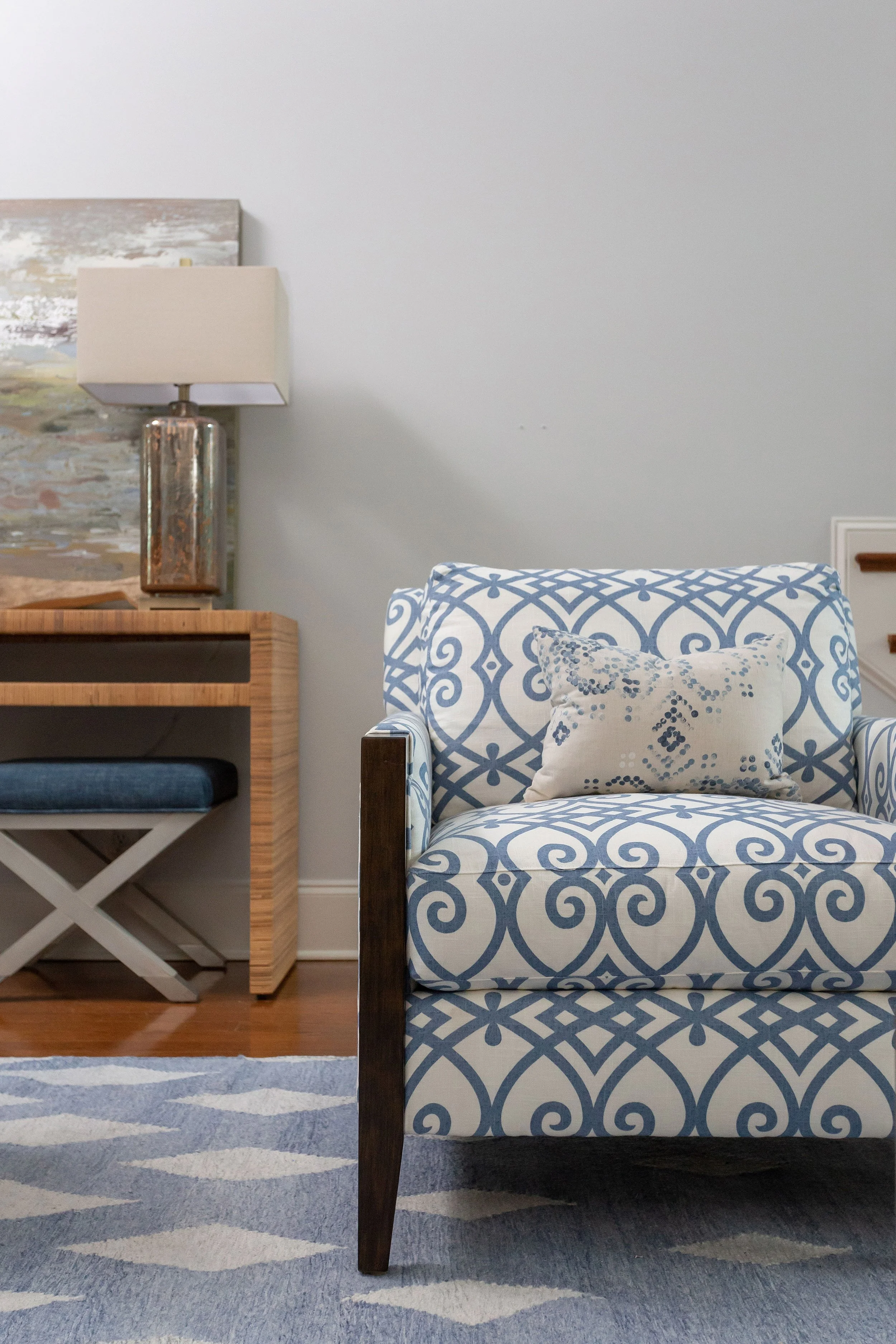 custom upholstered armchair in blue and white fabric for contemporary coastal design living room design durham north carolina by cat french design durham interior designer