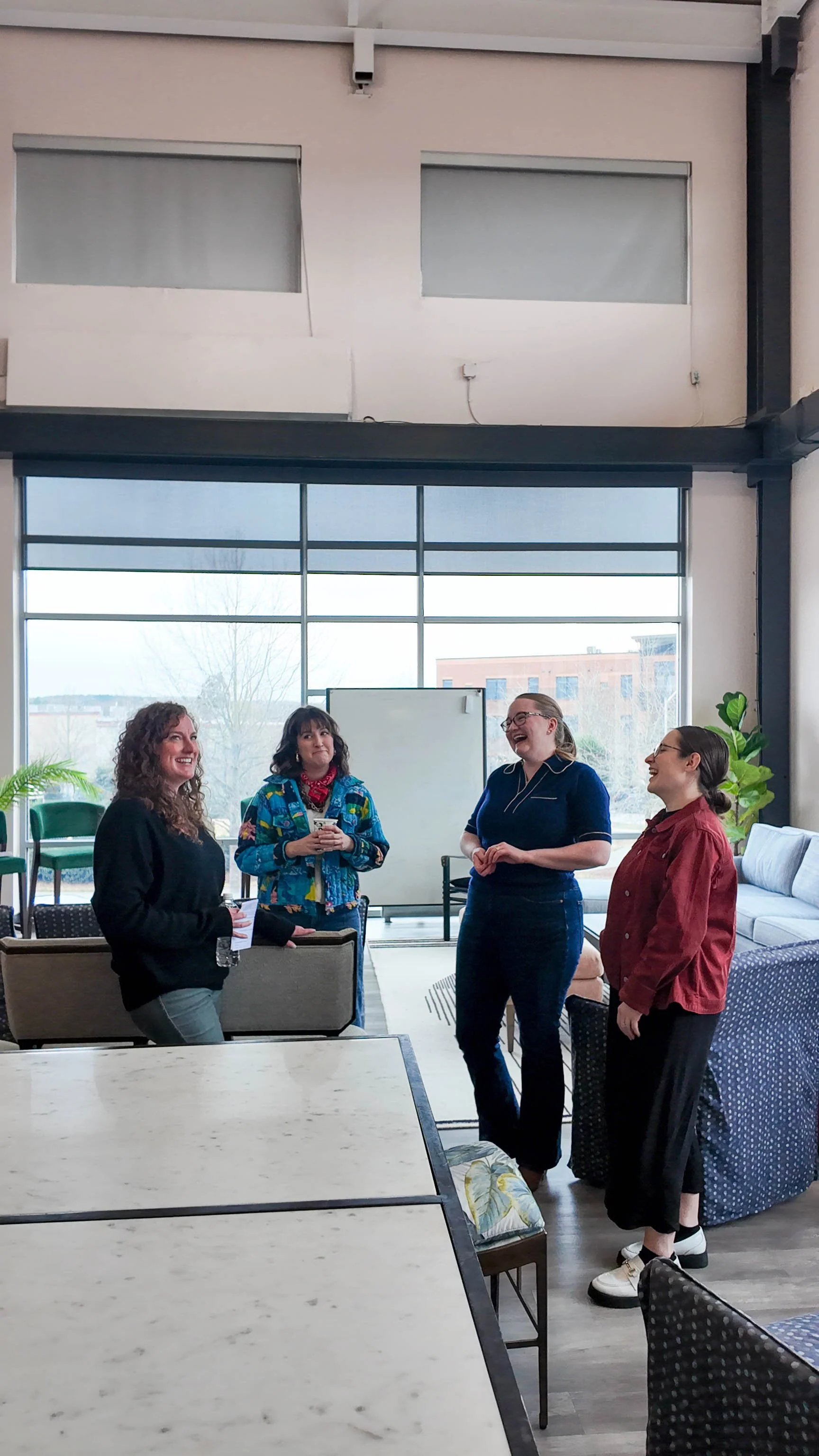 Chapel Hill interior designer cat french talking with other north carolina interior designers at women of design event held at the cat french design studio chapel hill interior designer durham interior designer