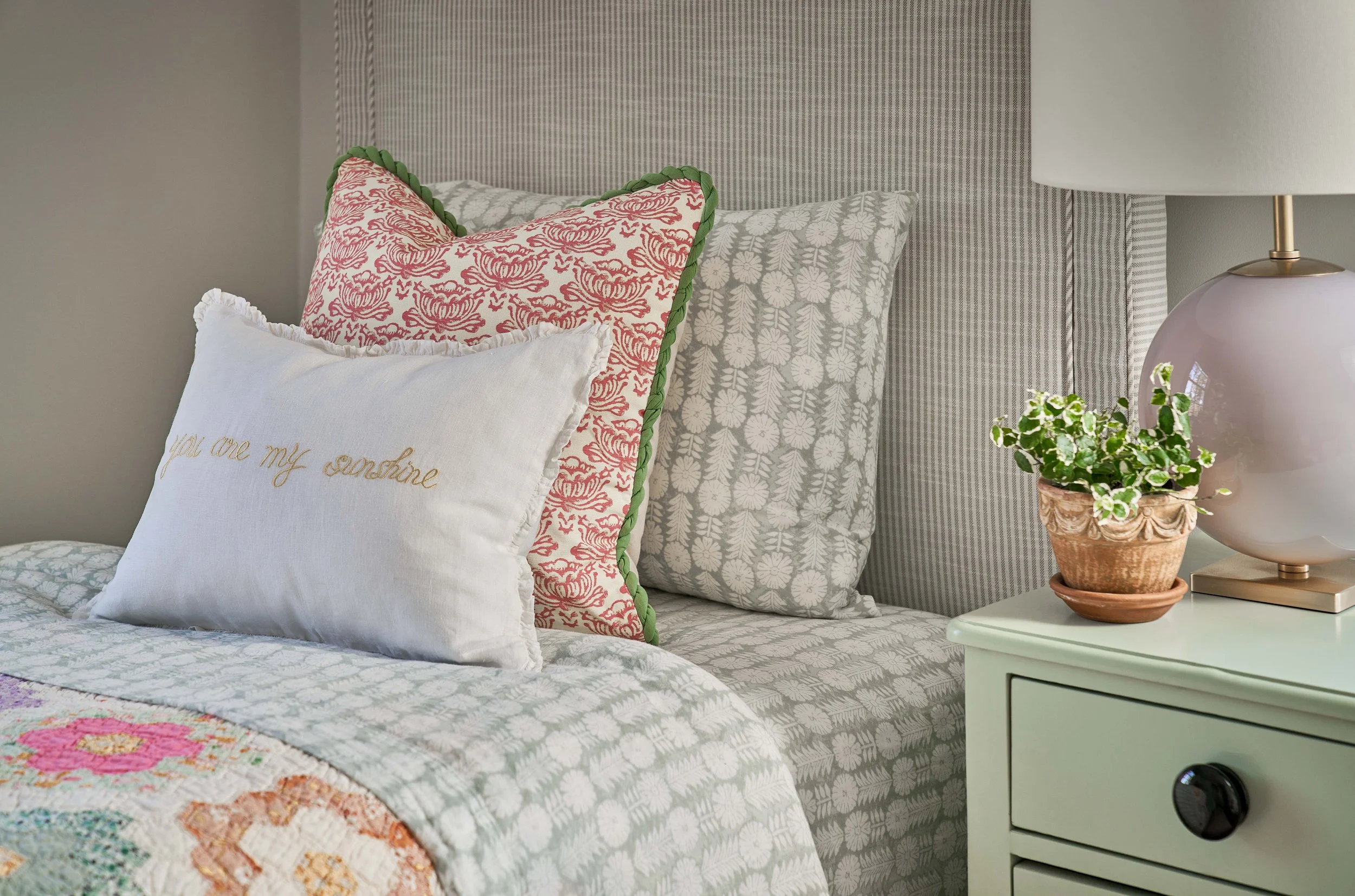 colorful cozy twin bed girls bedroom design vintage quilt purple visual comfort lamp historic home renovation cat french design chapel hill interior designers