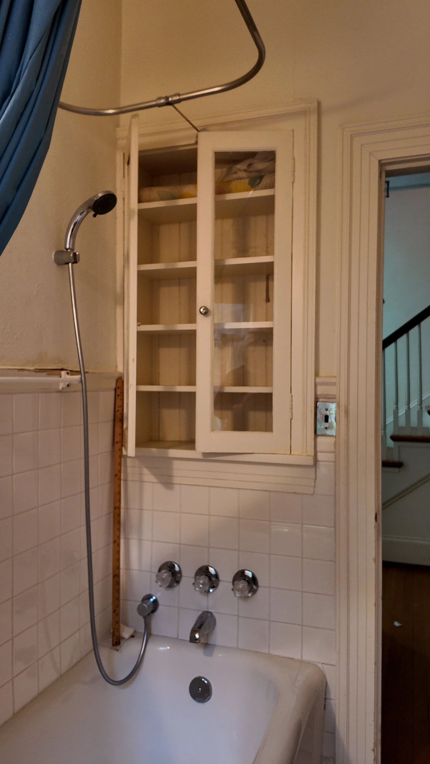 historic home bathroom with original tub and tile renovation cat french design chapel hill interior designer durham interior designer