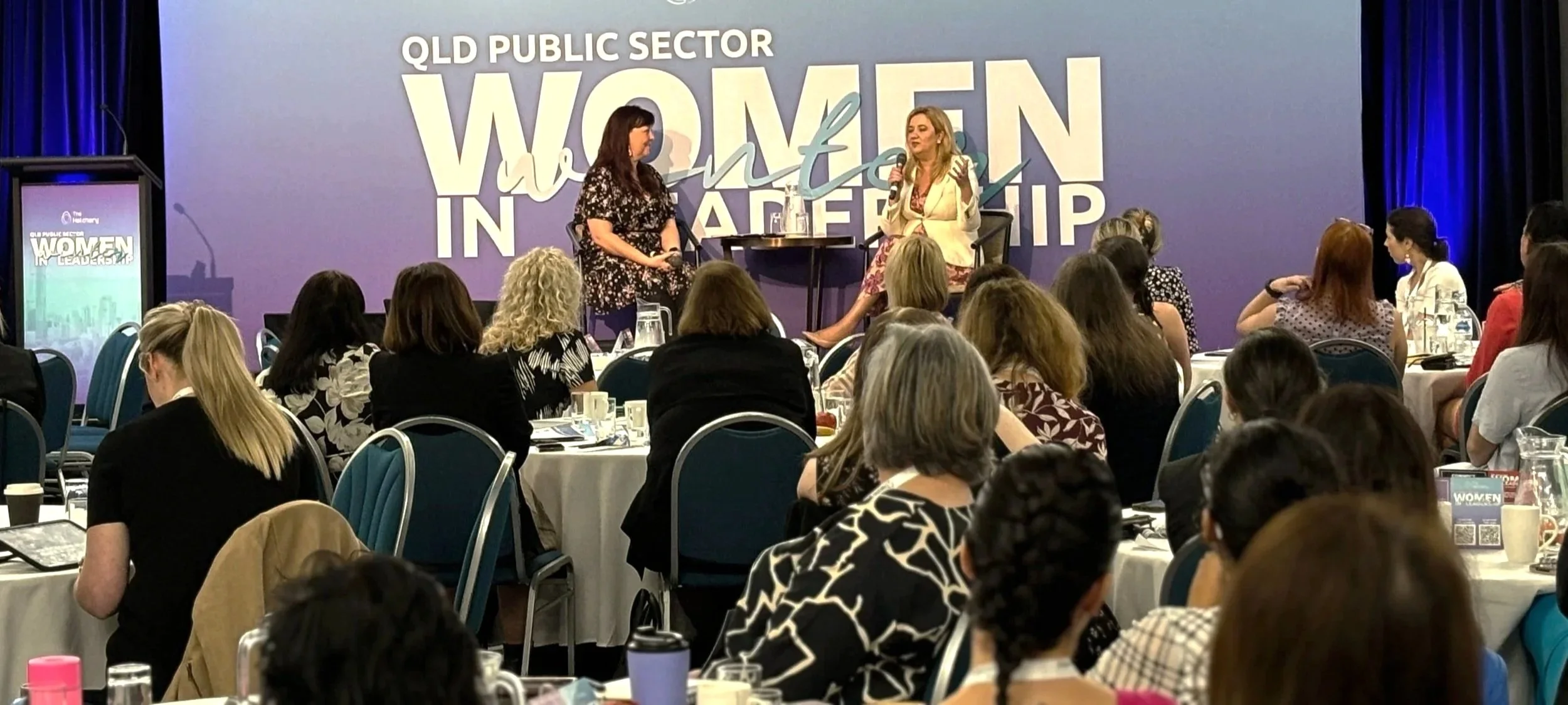 Eleanor interviewing former QLD Premier Annastacia Palaszuzuk at a conference
