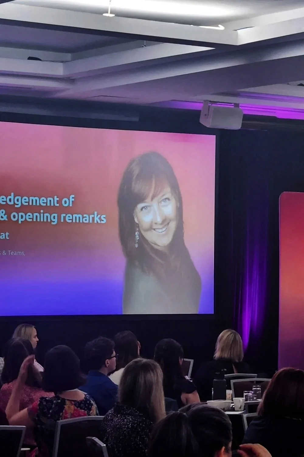 Eleanor on the big screen at a leadership conference