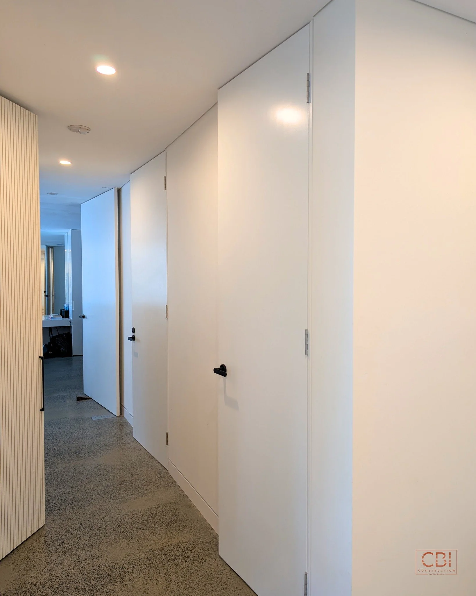 A clean, uninterrupted flow with flush, white internal doors and streamlined joinery. It's the little things that turn a house into a sophisticated, custom-built home.

Bring your dream home to reality.

📞 0485 908 863
📧 sales@cbi.construction
Ques