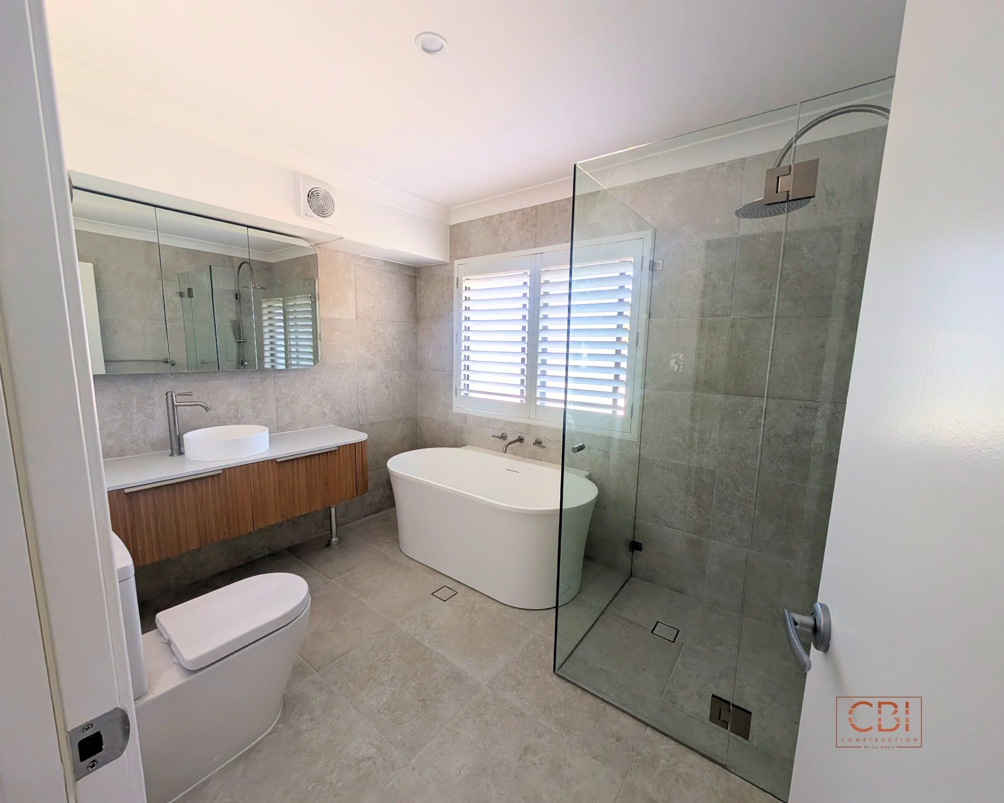 Creating a relaxing retreat with this luxury bathroom renovation. Highlights include a freestanding tub, custom timber vanity, and frameless walk-in shower. Our attention to detail ensures a premium finish.

Ready to start your reno? Get in touch wit