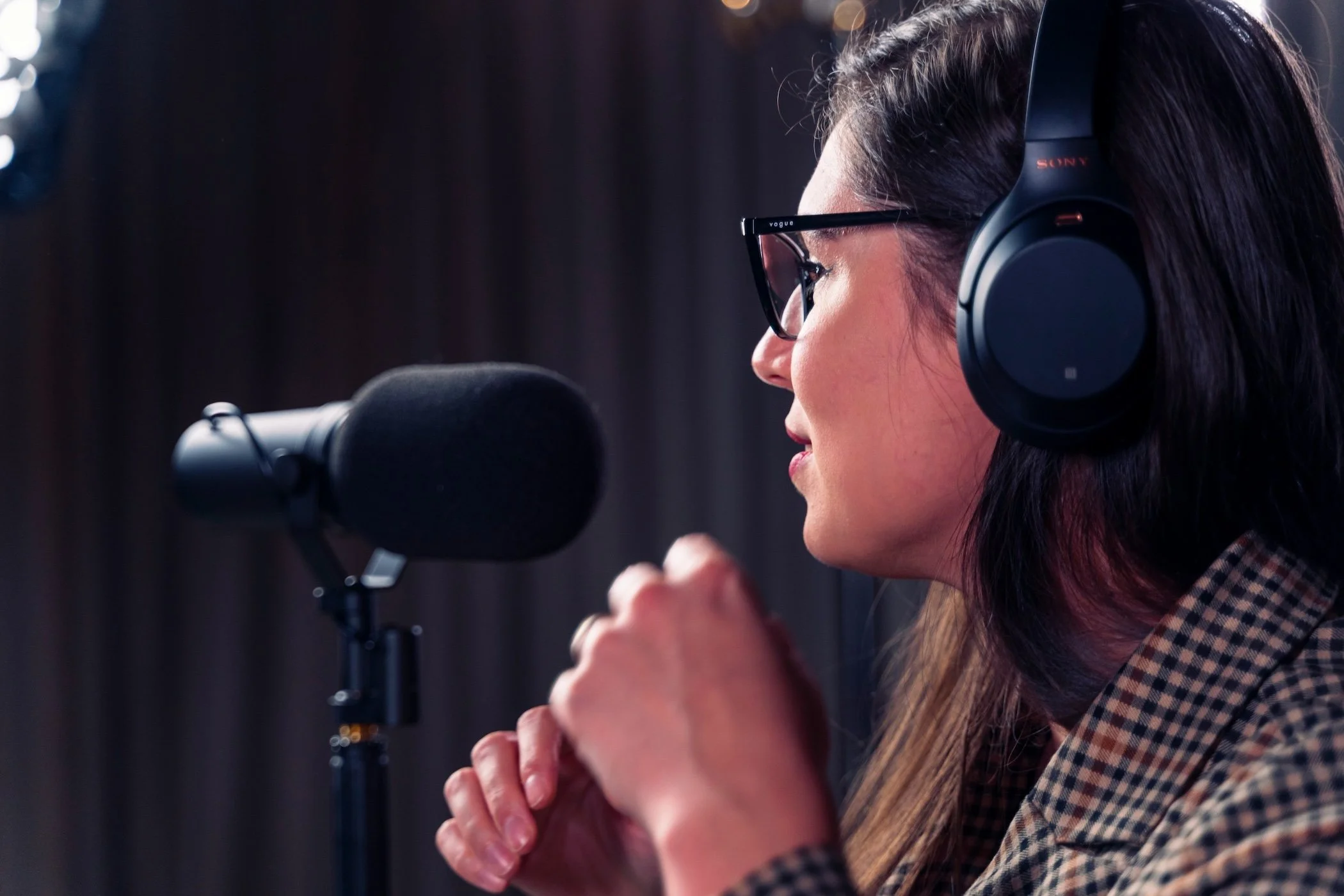 Woman recording a podcast