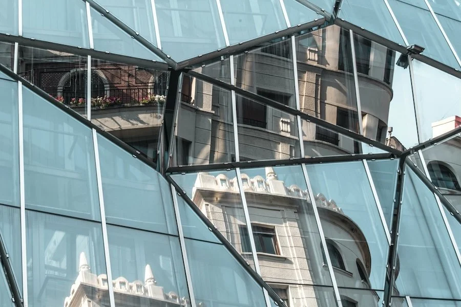 Reflections of buildings in windows