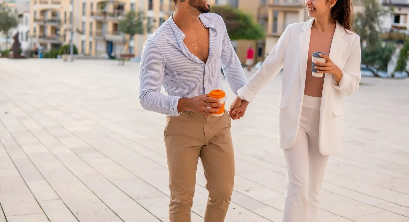 a couple walking together outside