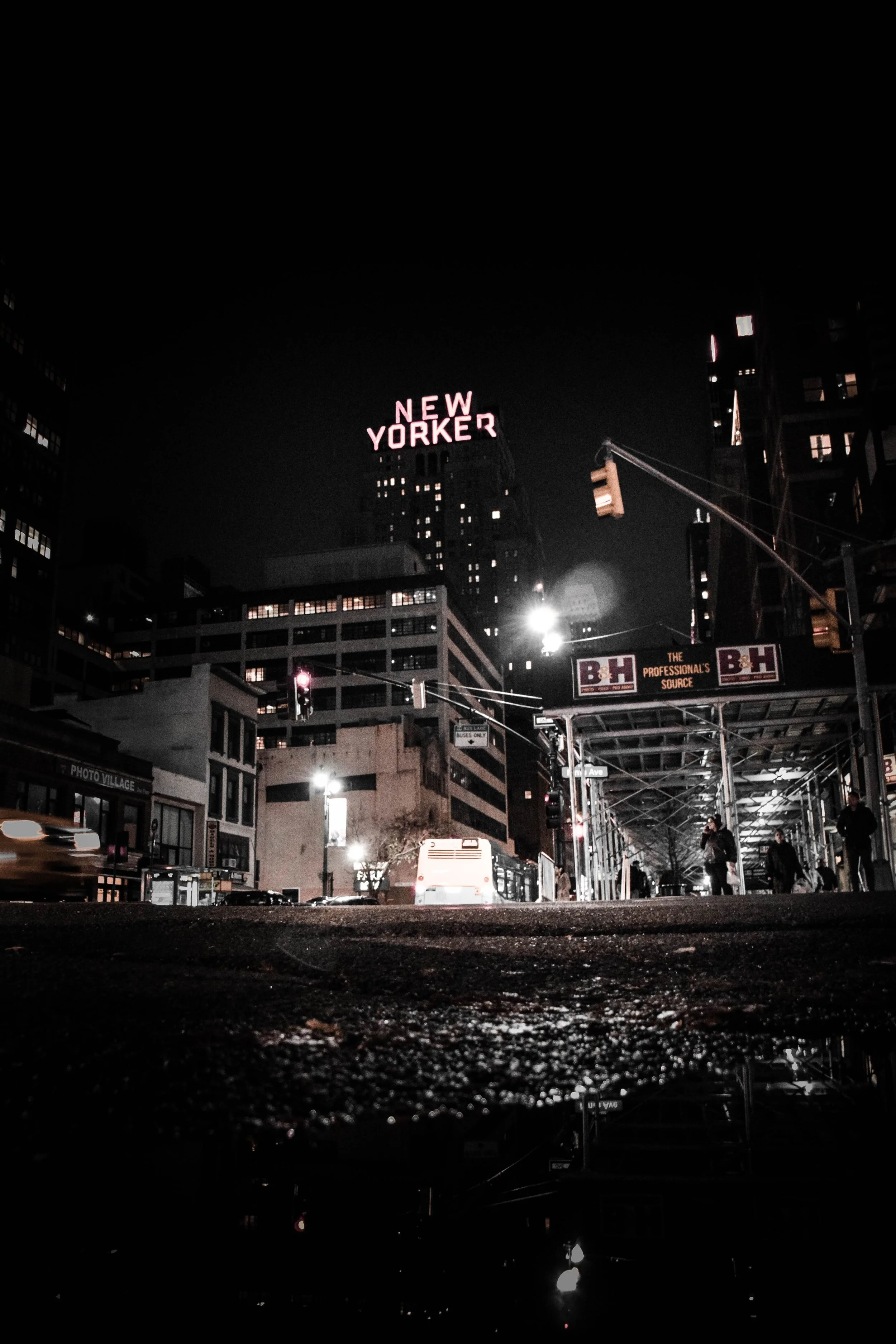 A nighttime view of a New York City street