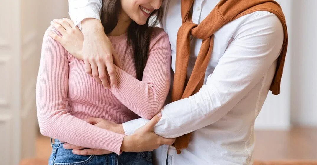 A couple embracing each other